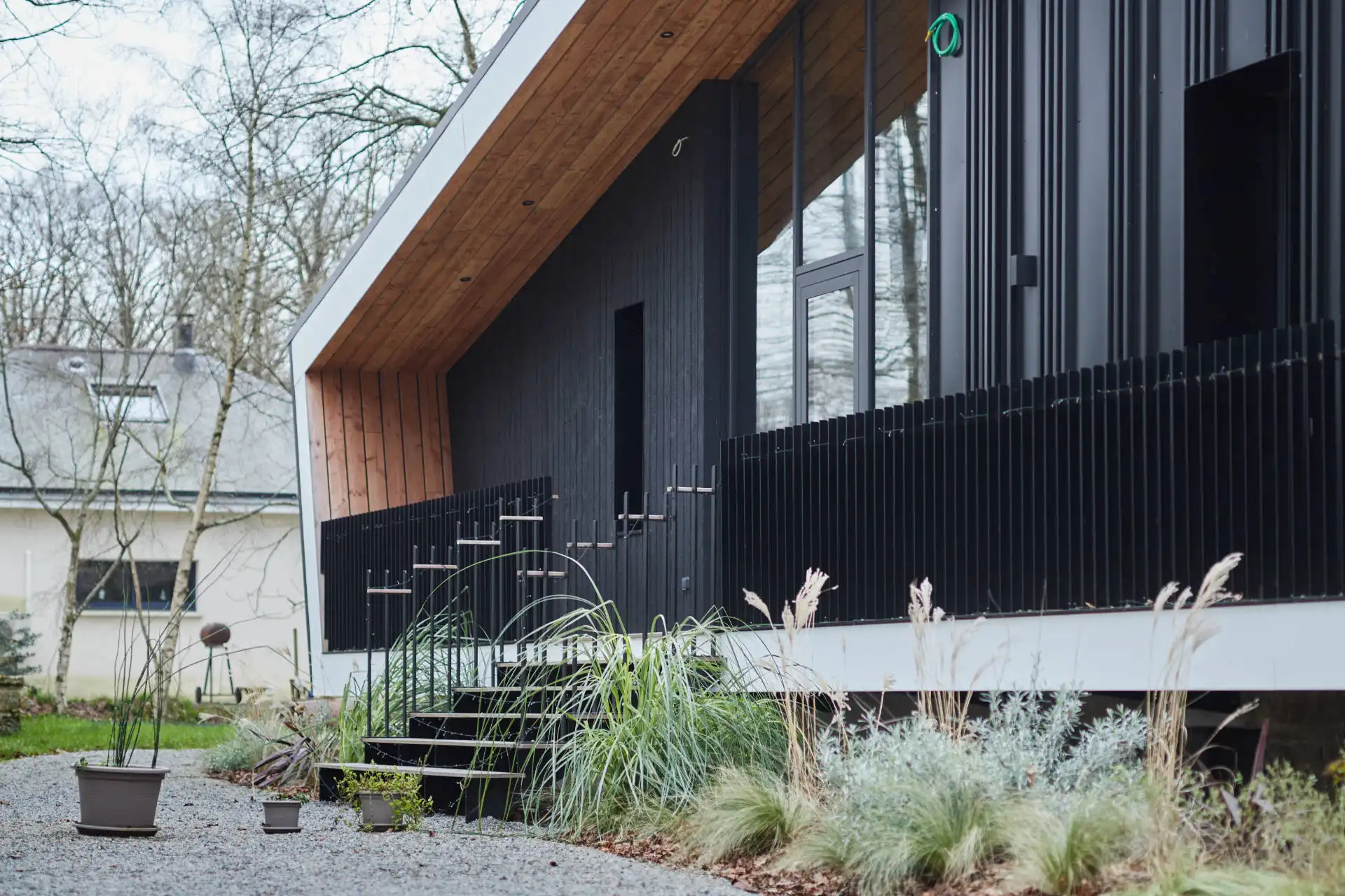 maison individuelle ossature béton, acier et bois 10