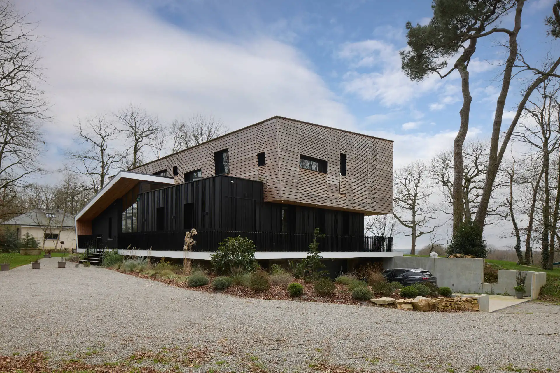 Logement individuel ossature béton, acier et bois