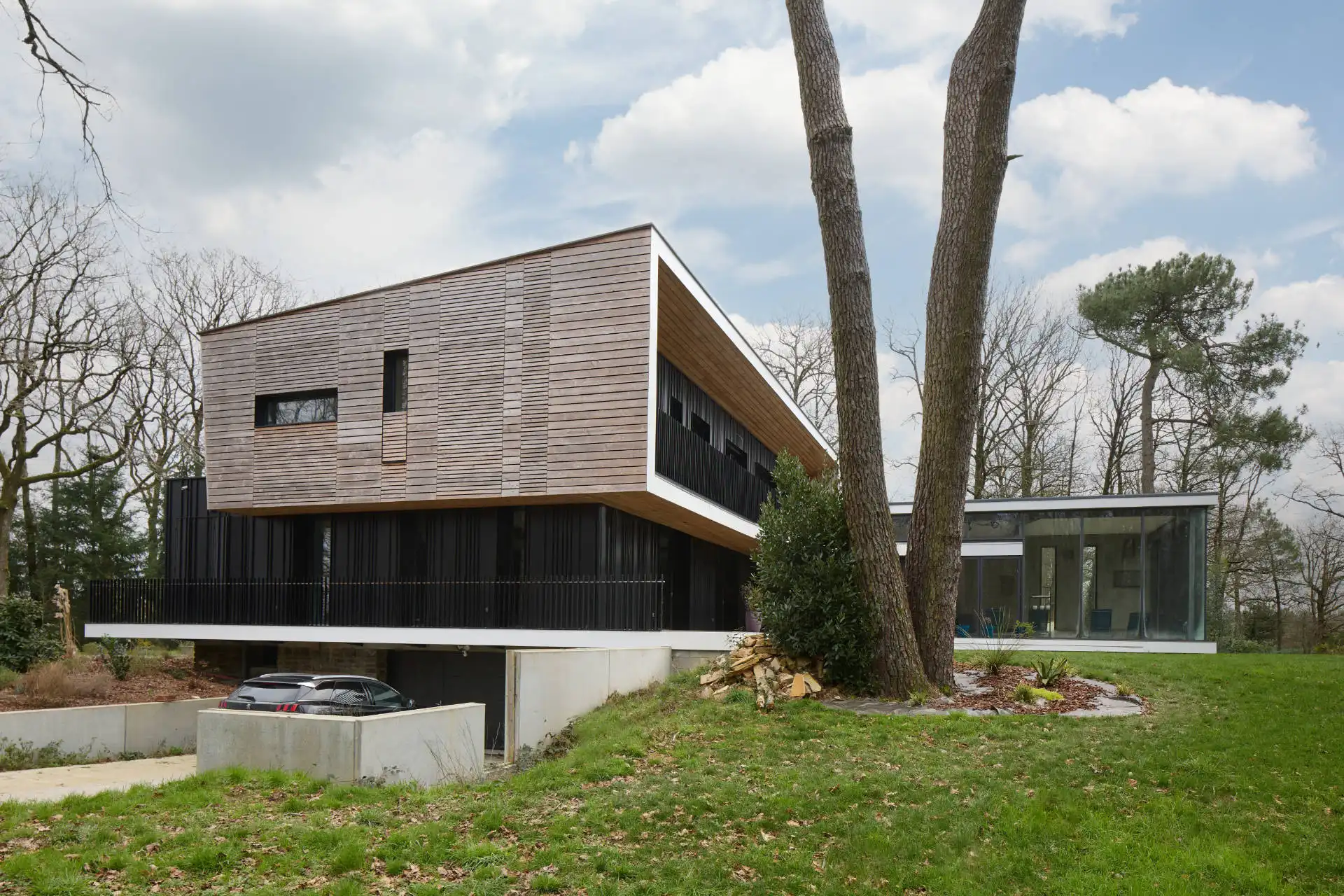 maison individuelle ossature béton, acier et bois 9